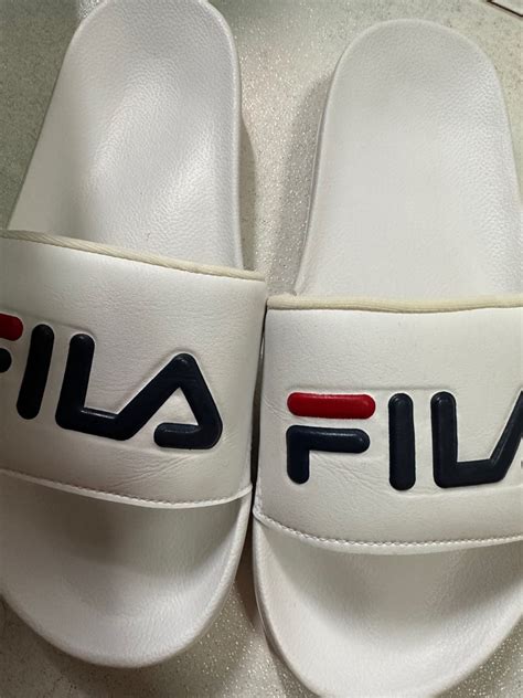 fila slippers original.